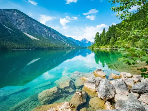 Reflections at lake "Plansee", Austria