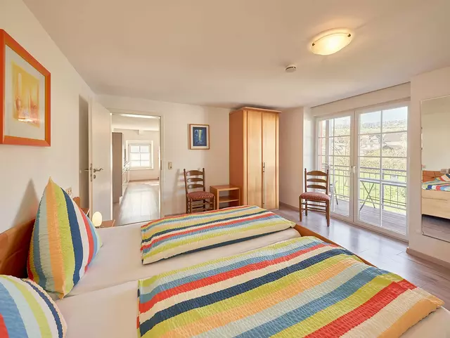 Ferienwohnung mit Schlafzimmer auf dem Weingut Steffen-Herzog