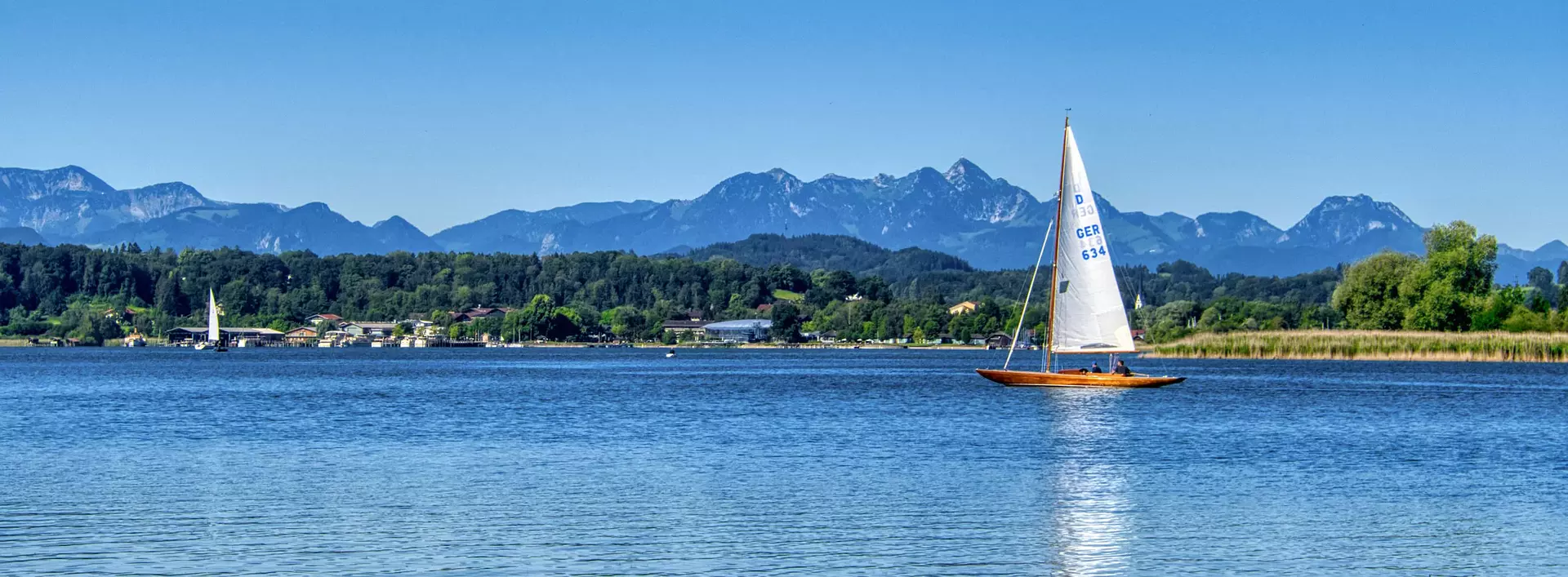 im Urlaub auf dem Bauernhof am Chiemsee eine Segeltour machen