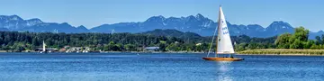 im Urlaub auf dem Bauernhof am Chiemsee eine Segeltour machen