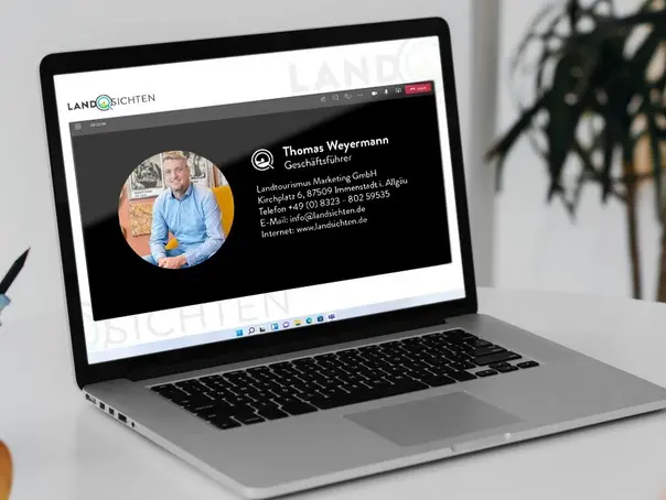 Zeigt einen Laptop auf dem screen sieht man die Ansprechperson bei Landsichten Thomas Weyermann