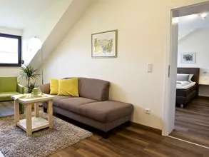 Ferienwohnung mit Wohnraum und Schlafzimmer auf dem Wein- und Wohngut Paulushof