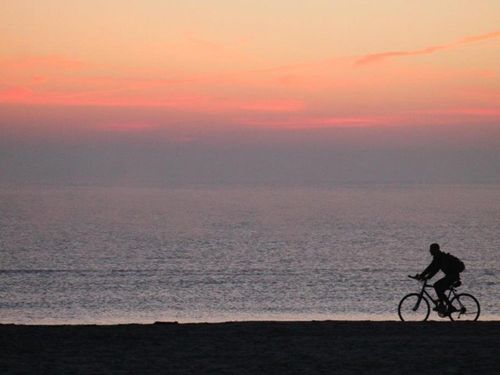 Fahrradfahrer am Strand von Karlshagen Fahrradfahrer am Strand von Karlshagen