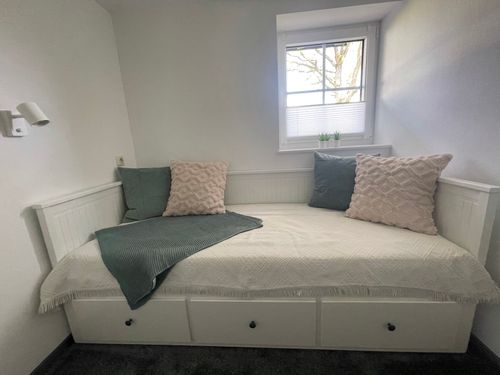 Schlafzimmer mit Ausziehbett