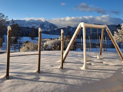 Winterbild Schaukel Winterbild Schaukel