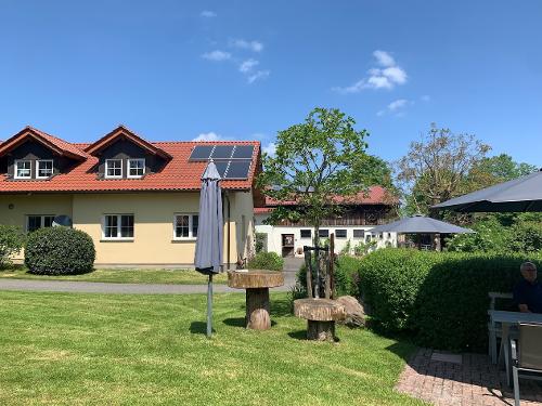 Ferienhof Sennert Garten mit Sitzgruppen Ferienhof Sennert Garten mit Sitzgruppen