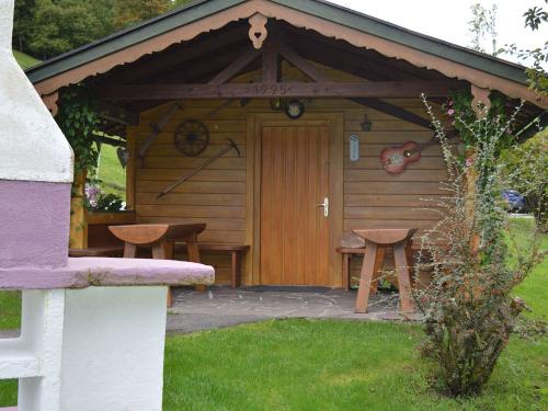 Gartenlaube mit Grill