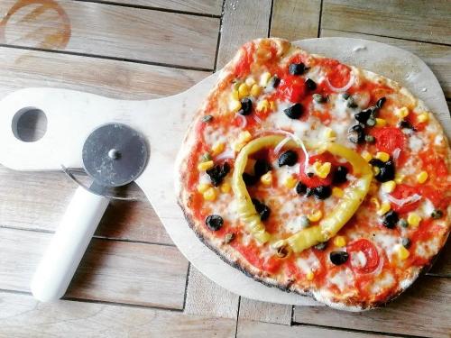 Pizza backen im Holzofen