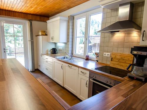 Die zusätzliche Gästeküche zum gemeinsamen Kochen