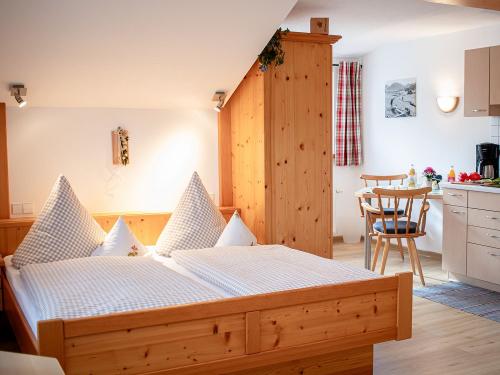 Appartement Grüntenblick - Wohn-Schlafbereich Appartement Grüntenblick - Wohn-Schlafbereich