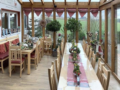 Wintergarten und Frühstücksraum