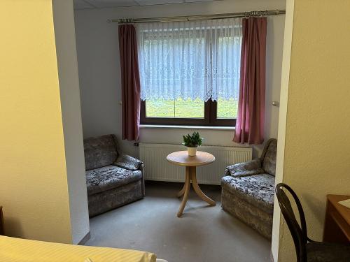 Aufbettungssessel im Doppelzimmer