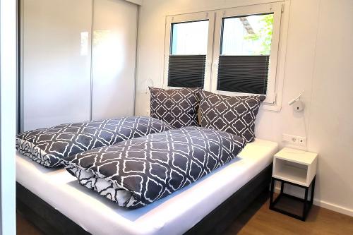 Tiny House: Schlafzimmer mit Doppelbett