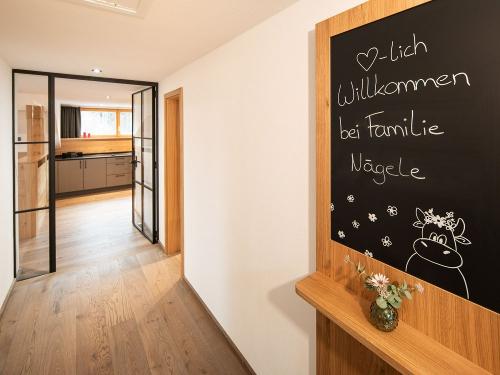 Ferienwohnung Weitblick - Willkommensschild im Flur
