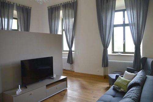 Ferienwohnung Herrenhaus Burg Posterstein - Wohnbereich
