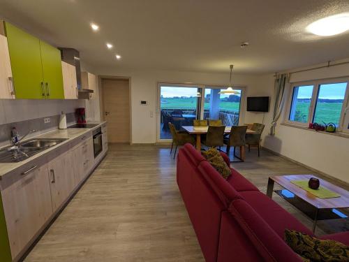 Wohnbereich mit Küche Wohnbereich mit Küche