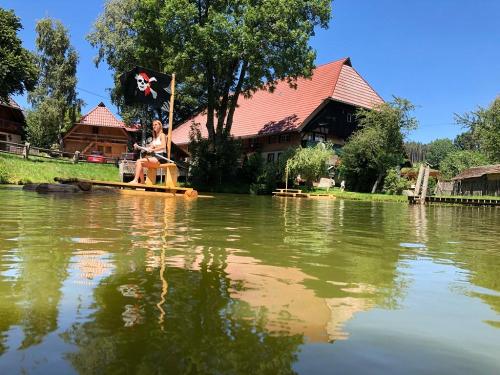 Flossfahrt auf dem Weiher